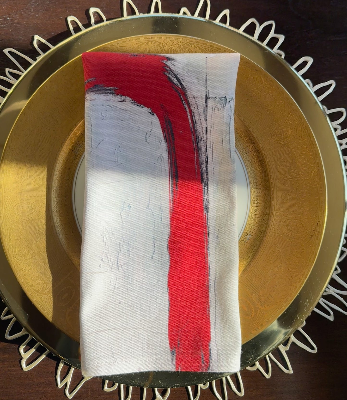 Artsy cloth napkins in a bold abstract design created by Lori Brunner Art to elevate your dining and entertaining experiences