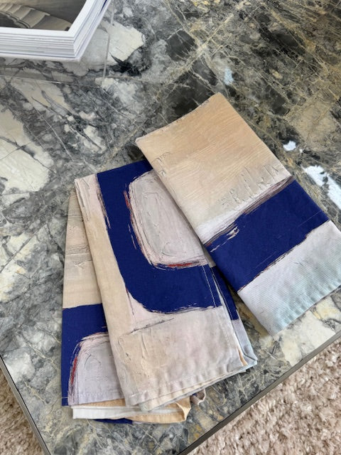 Modern, artist-designed blue cloth napkins with abstract design for the elevated dining table sustainable table linens eco-friendly entertaining