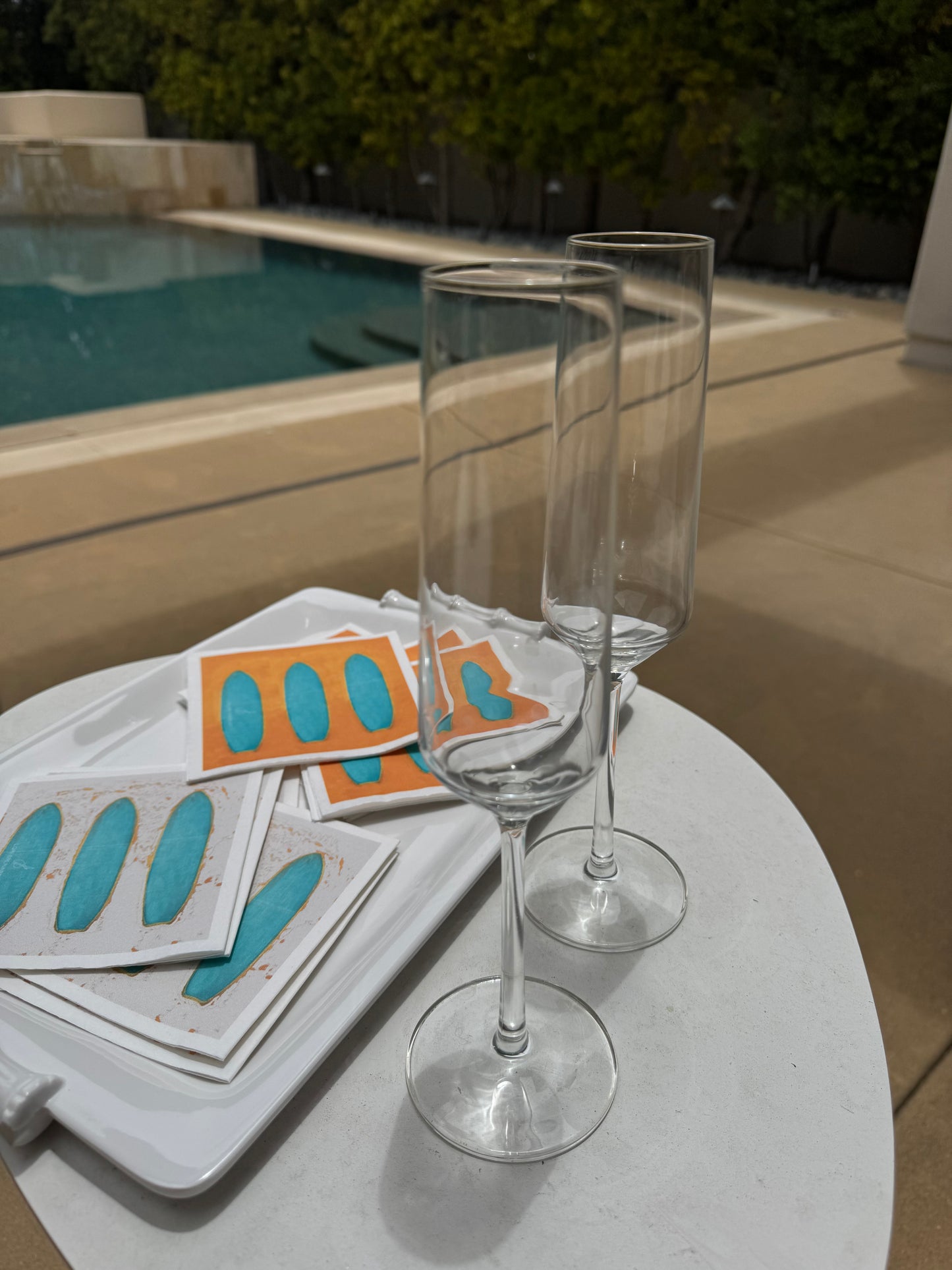 Artful cocktail napkins with a surfboard design by Lori Brunner Art