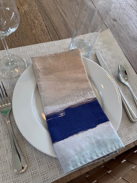 Modern, artist-designed blue cloth napkins with abstract design for the elevated dining table sustainable table linens eco-friendly entertaining