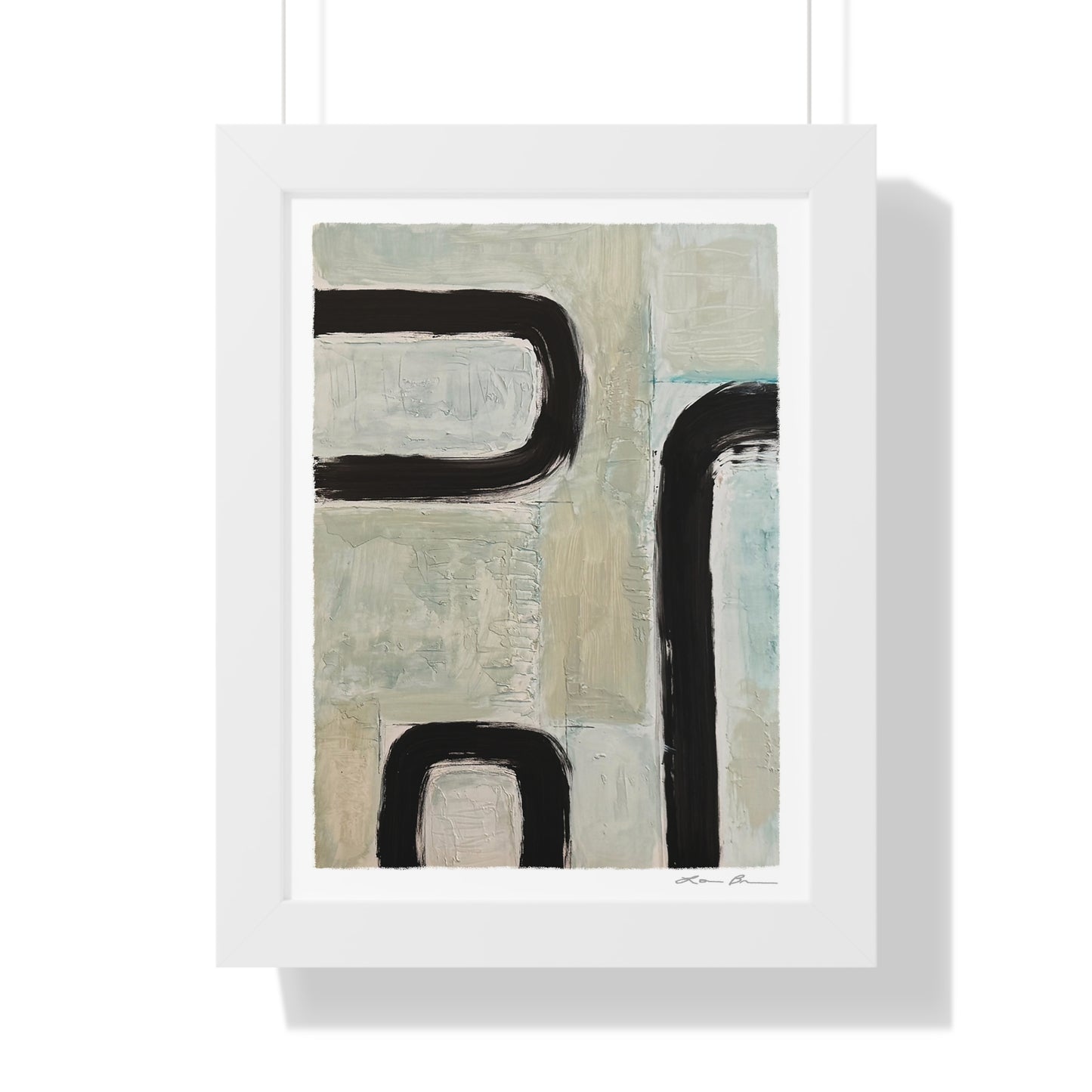 Abstract art print with black and beige shapes in a white frame on a white background