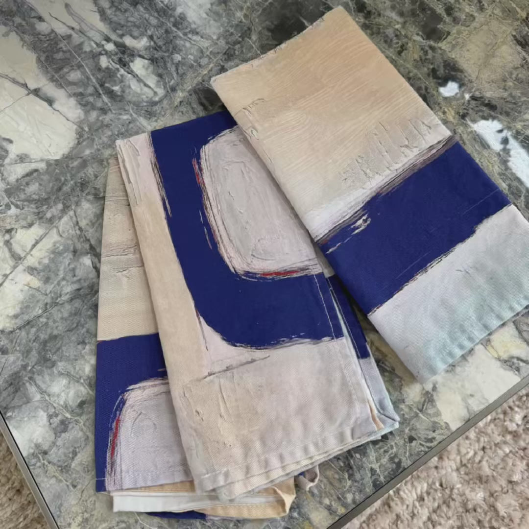 Modern, artist-designed blue cloth napkins with abstract design for the elevated dining table sustainable table linens eco-friendly entertaining